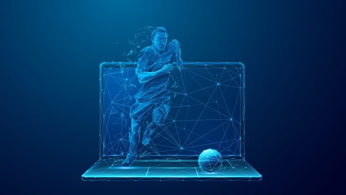 Genius Sports partnership with European leagues visualised by Abstract Soccer Player Runs Out of the Laptop Screen. Cyber sport or Sports Betting futuristic concept. Digital Football Player on Mobile Computer in Low Poly Wireframe Style on Dark Blue Background.