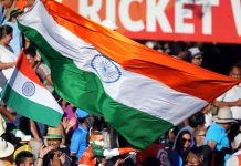 Indian sports revenue could shift amid Google and Meta probe India fans wave their national flags during the Pool B Cricket World Cup match between India and Ireland at Sedden Park in Hamilton on March 10, 2015. AFP PHOTO / Michael Bradley.