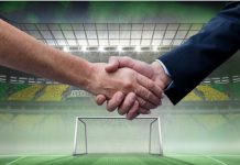 Should the WSL embrace joint deals like La Liga? Composition of businessmen shaking hands over sports stadium. sports, deal, agreement and competition concept digitally generated image.
