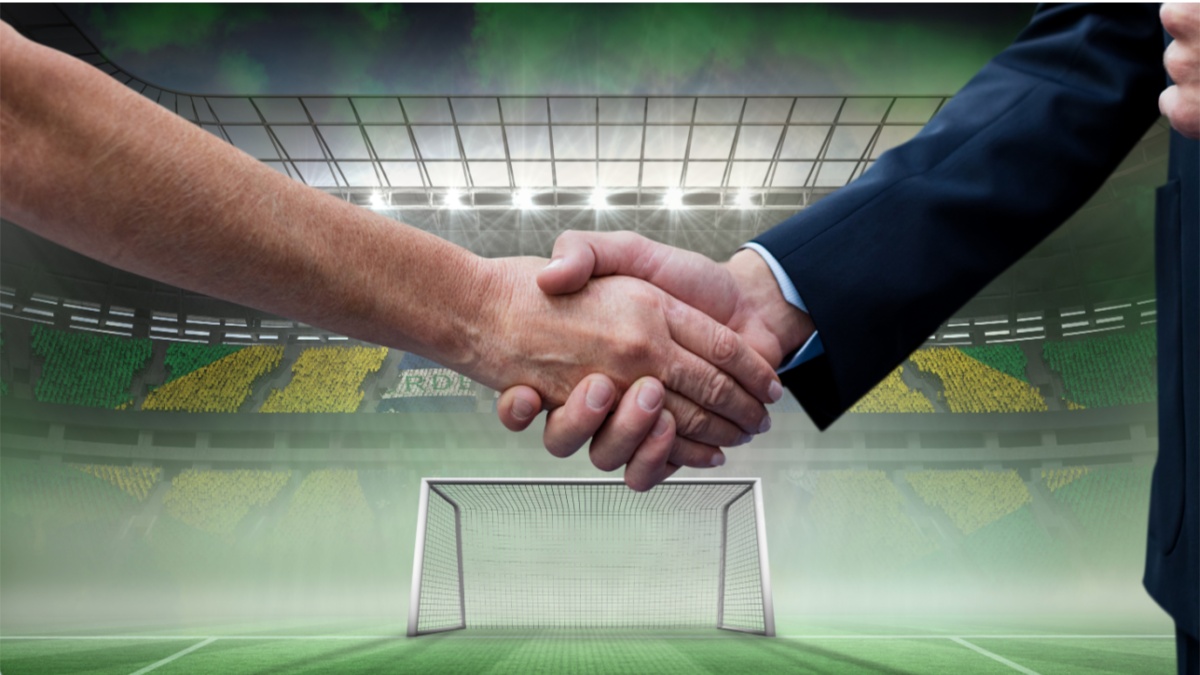 Composition of businessmen shaking hands over sports stadium. sports, deal, agreement and competition concept digitally generated image.