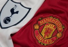 Manchester United owner sues Spurs over Audi deal talks BANGKOK, THAILAND - OCTOBER 23: The Logo of Tottenham Hotspur and Manchester United on Football Jerseys on October 23 ,2017 in Bangkok Thailand.
