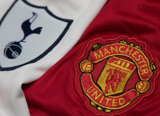 Manchester United owner sues Spurs over Audi deal talks BANGKOK, THAILAND - OCTOBER 23: The Logo of Tottenham Hotspur and Manchester United on Football Jerseys on October 23 ,2017 in Bangkok Thailand.