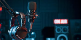 Your football podcast has an FPL league – Here’s why Professional microphone and headphones at the radio station, entertainment and communication concept.