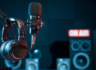 Your football podcast has an FPL league – Here’s why Professional microphone and headphones at the radio station, entertainment and communication concept.