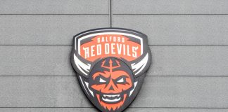 Salford COO resigns claiming misogynistic pressure from club owners Manchester, United Kingdom - 2nd Aug 2025: Stadium sign for the Salford Red Devils rugby team.