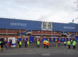 Arise Capital Partners completes Sheffield Wednesday takeover SHEFFIELD, ENGLAND - DECEMBER 7, 2019: View of Leppings Lane and the West Stand at Hillsborough Stadium in Sheffield, England.