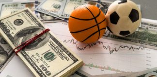 How Sports Leagues can strengthen Spot Fixing Early Warning Systems Image of a small toy basketball and football on top of a wad of dollar bills, representative of spot fixing