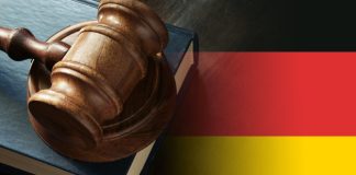DAZN’s hit by German lawsuit amid billion user dream Gavel and legal book on wooden table, collage with german flag.