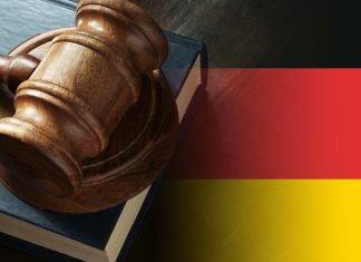 DAZN’s hit by German lawsuit amid billion user dream Gavel and legal book on wooden table, collage with german flag.