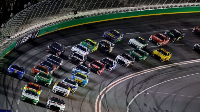 July 09, 2023 - Hampton, GA, USA: NASCAR Cup Driver, AJ Allmendinger (16) races off turn four during the Quaker State 400 Available at Walmart at the Atlanta Motor Speedway in Hampton GA.