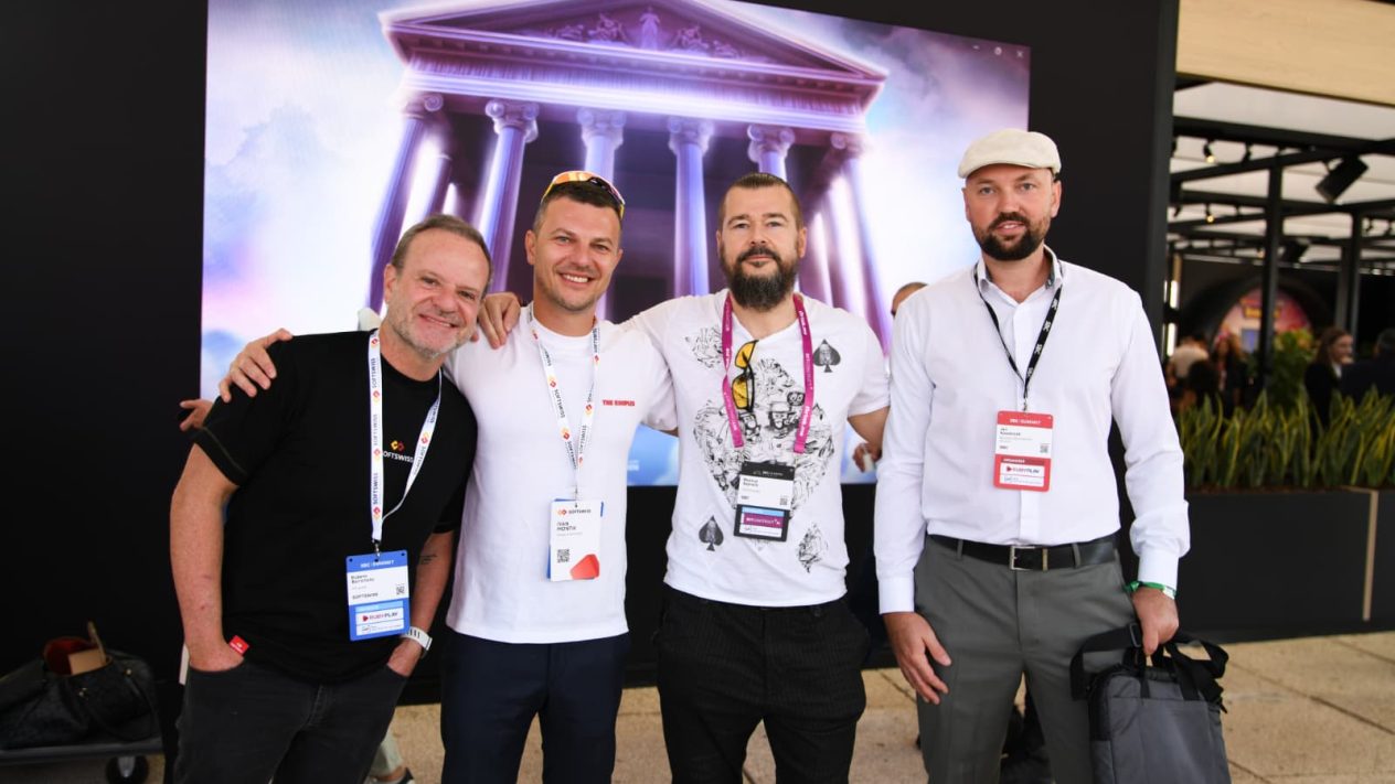 Image of Rubens Barrichello with SOFTSWISS founder and CEO van Montik and Rasmus Sojmark, CEO of SBC