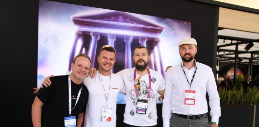 Image of Rubens Barrichello with SOFTSWISS founder and CEO van Montik and Rasmus Sojmark, CEO of SBC