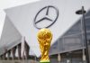 World Cup fever expected to lift UK sports by £3.1bn THE USA, ATLANTA, 17 OCTOBER 2019: World Cup FIFA on background Mercedes-Benz Stadium in Atlanta state of Georgia. FIFA World cup of football will takes in North America and South America in 2026.