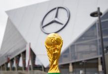 FIFA World Cup 2026 faces new week of controversies THE USA, ATLANTA, 17 OCTOBER 2019: World Cup FIFA on background Mercedes-Benz Stadium in Atlanta state of Georgia. FIFA World cup of football will takes in North America and South America in 2026.