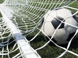 BOXXER’s Ben Shalom enters the pitch with new football agency Goal in the back of net in soccer game. Representing the Baller league withdrawing from Germany