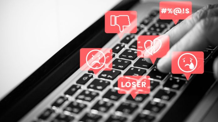 Social media troll harassing people on social media