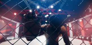 OKTAGON says fighters won’t risk match-fixing Portrait man MMA fighter on octagon ring. Fighting Championship, dark background.