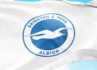 Brighton owner rejects betting allegations as political concern grows Çorum, Turkey, May 2024: The flag Brighton - Hove Albion waving in the wind on a clear day. Brighton - Hove Albion is a English professional football club.