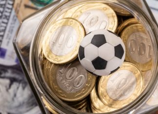 885 Capital: Baller League and the future of sports investing Symbolic soccer ball, 100 KZT coins and 100 US dollar bills.