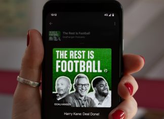 Will Gary Lineker feature in Netflix’s World Cup coverage? Hebden Bridge, West Yorkshire UK. August 17, 2023. The Rest is Football podcast playing on a Google Pixel 4 mobile phone. Woman's hand with red nails. Episode Harry Kane with Gary Lineker.