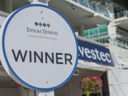 Frank Warren brings Queensberry boxing flair to horse racing Epsom Downs,Surrey / England - August 4th 2018: Winner sign at the famous Epsom Downs Race course, which is owned by the Jockey Club and best known for hosting the Derby Stakes.