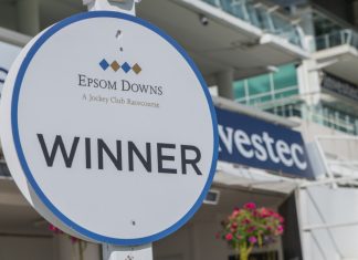 Frank Warren brings Queensberry boxing flair to horse racing Epsom Downs,Surrey / England - August 4th 2018: Winner sign at the famous Epsom Downs Race course, which is owned by the Jockey Club and best known for hosting the Derby Stakes.