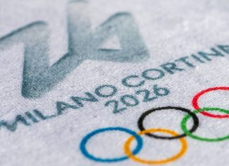 Samsung VP says Olympic sponsorship must reflect how fans follow athletes, not events MILAN, ITALY, OCTOBER 20, 2025: Logo of Winter Olympics Game 2026 in Milano and Cortina, Italy. White background, macro and detail