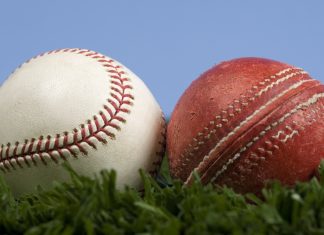 How ICC plans to win over baseball fans in the US and Canada ICC cricket ball and baseball on grass with blue sky - illustration of the way things change. Baseball is an evolution of cricket