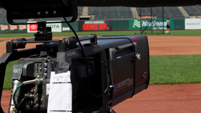 San Francisco - June 8, 2022: A broadcast camera with lineups taped to it before a game between the Colorado Rockies and San Francisco Giants at Oracle Park MLB.