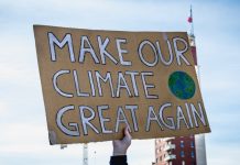 Olympians fight climate change but LA28 odds look grim Turin (Torino), Piedmont, Italy - March 15th 2019: make our climate great again sign during fridays for future strike.