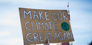 Olympians fight climate change but LA28 odds look grim Turin (Torino), Piedmont, Italy - March 15th 2019: make our climate great again sign during fridays for future strike.