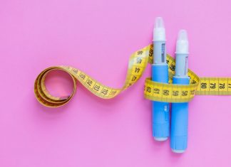 Elite sport can’t pretend it’s immune to the Ozempic era Insulin pens wrapped in a measuring tape on a pink surface, illustrating healthcare, weight management, and chronic illness support. drugs injection ozempic for weight loss