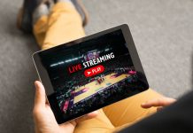Why streaming is now central to the business of global sport Man watching sports on live streaming online service