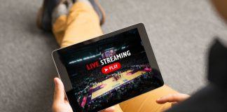 Why streaming is now central to the business of global sport Man watching sports on live streaming online service