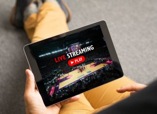 Why streaming is now central to the business of global sport Man watching sports on live streaming online service