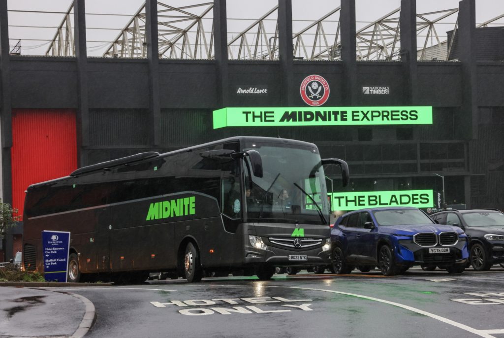 Midnite branding on coach outside of Sheffield United's stadium. 