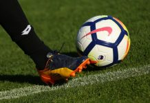 Liverpool leads the pack in latest Premier League financials LONDON, ENGLAND - JULY 26, 2017: New Nike Ordem 5 ball. Football player in Puma boots shoots the Official Premier League Ball.