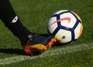 Liverpool leads the pack in latest Premier League financials LONDON, ENGLAND - JULY 26, 2017: New Nike Ordem 5 ball. Football player in Puma boots shoots the Official Premier League Ball.