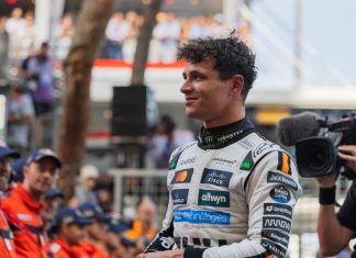Formula 1 extends Allwyn partnership with fan engagement focus Image of Lando Norris with Allwyn logo on his race suit
