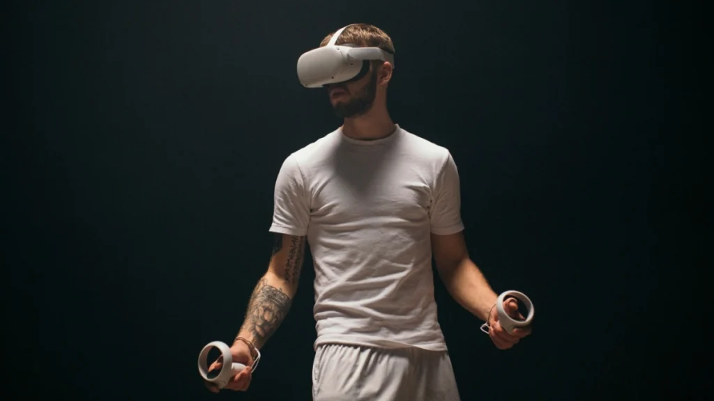 Football player training with VR headset. 