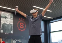 Why football should prioritise cognitive ROI over commercial Football player wearing a VR headset.