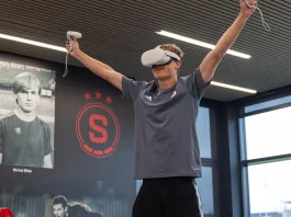 Why football should prioritise cognitive ROI over commercial Football player wearing a VR headset.