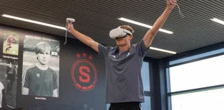 Why football should prioritise cognitive ROI over commercial Football player wearing a VR headset.