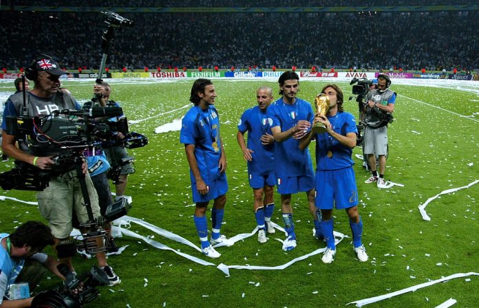 Berlin, GERMANY - July 09, 2006: Andrea Pirlo kisses the trophy during the 2006 FIFA World Cup Germany Final Italy v France at the Olympiastadion.