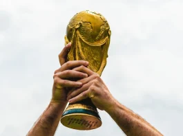 FIFA risks 22.6% World Cup reach loss amid India and China talks June 12, 2018, Doha, Qatar, A man holds the FIFA World Cup in his hands.