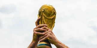 FIFA risks 22.6% World Cup reach loss amid India and China talks June 12, 2018, Doha, Qatar, A man holds the FIFA World Cup in his hands.