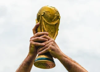 FIFA risks 22.6% World Cup reach loss amid India and China talks June 12, 2018, Doha, Qatar, A man holds the FIFA World Cup in his hands.