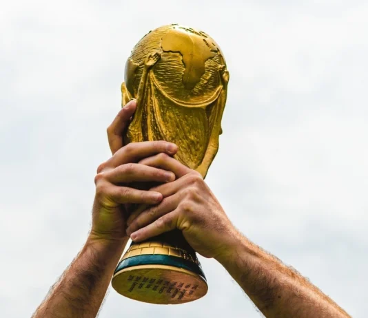FIFA risks 22.6% World Cup reach loss amid India and China talks June 12, 2018, Doha, Qatar, A man holds the FIFA World Cup in his hands.