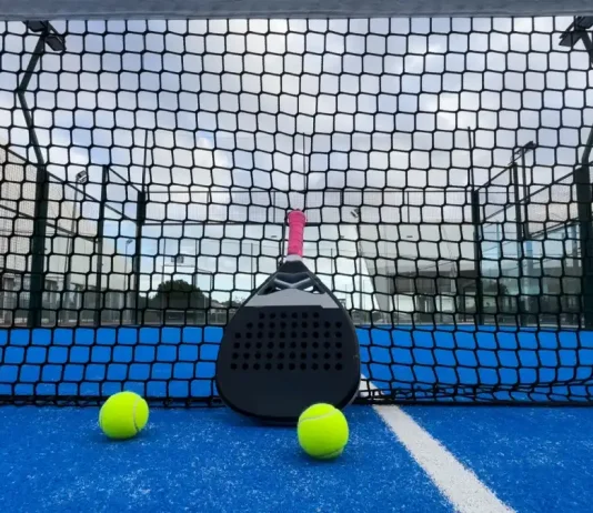 Q&A: Can padel ever become a ‘serious’ professional sport? Padel racket on a padel blue court with a ball.