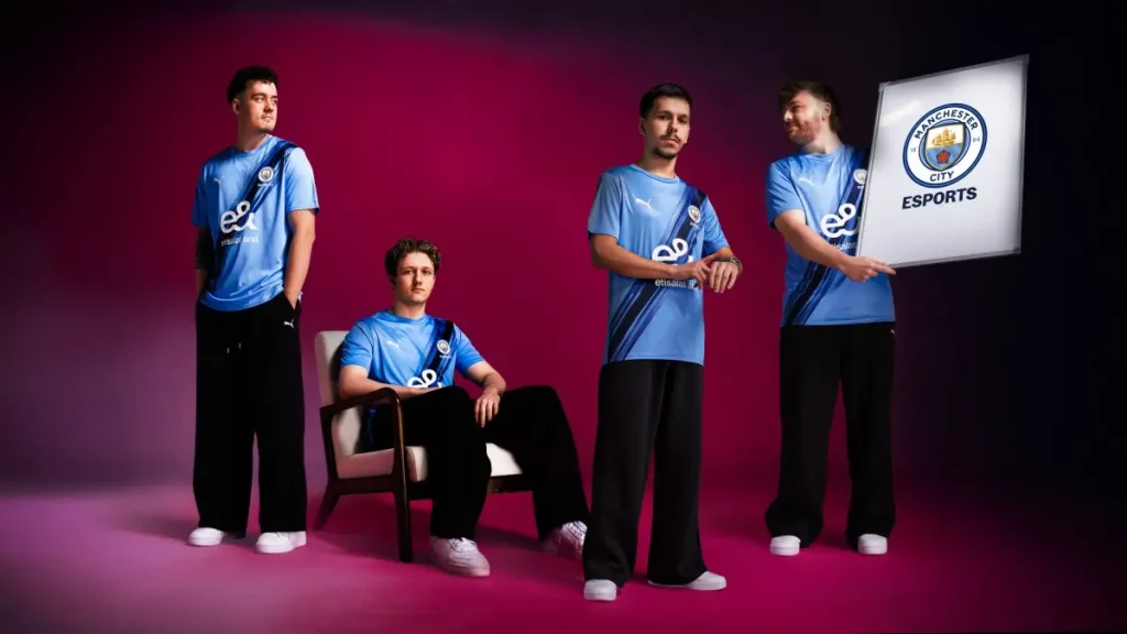 Man City Rocket League esports team holding a Manchester City badge.